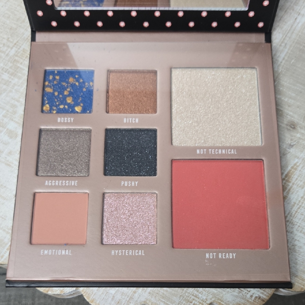 Bossy Eyeshadow Palette with Blue, Brown, and Red Shades